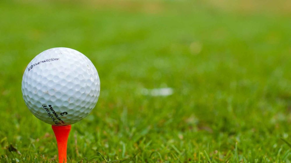 A golf ball on the tee